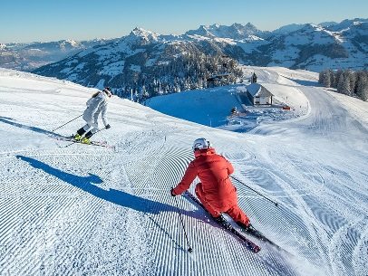 two solo skiers in Kitzbühel Austria