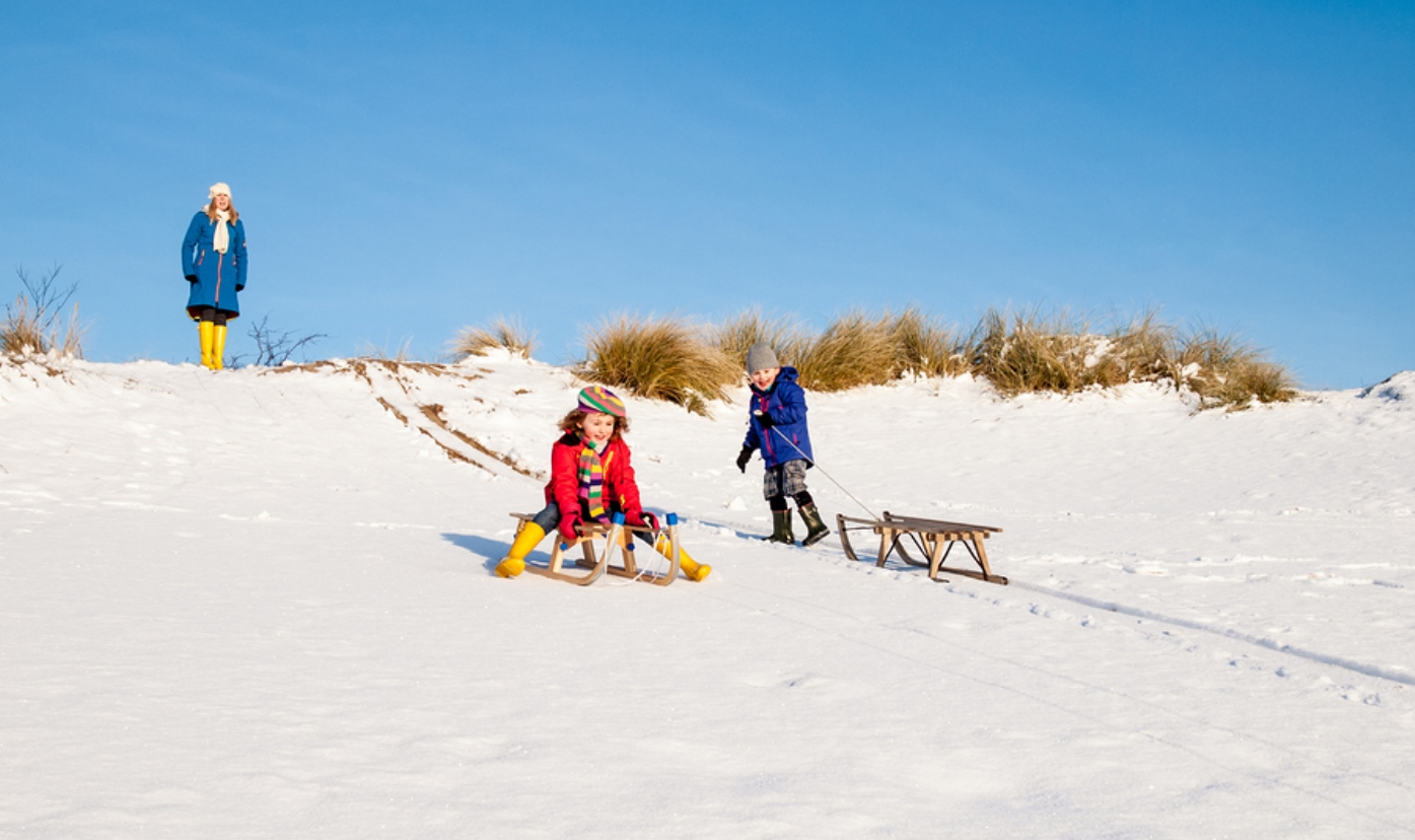 A single parent's guide to travelling at Christmas - tobogganing