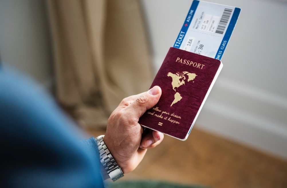 men holding passport