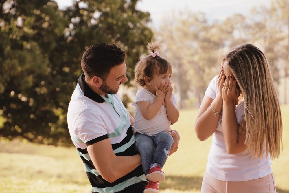 single parent dating - woman joking with child