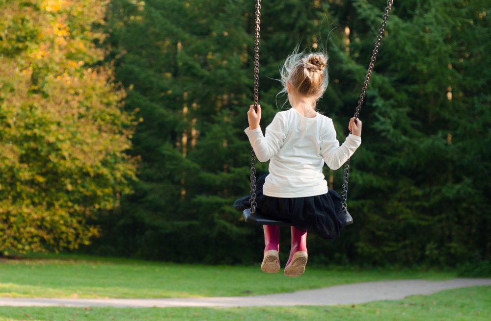 family activity - girl on swing