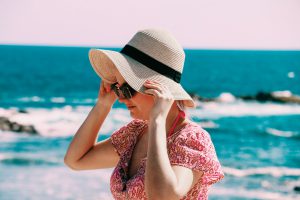 singles holidays over 40 - woman in sunhat
