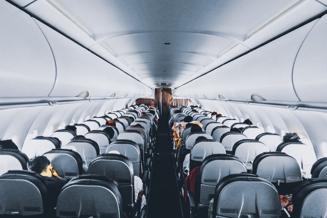 why do flight prices change - rows of seats in plane