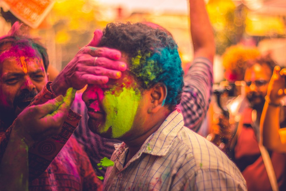 Holi festival in India - painting strangers face