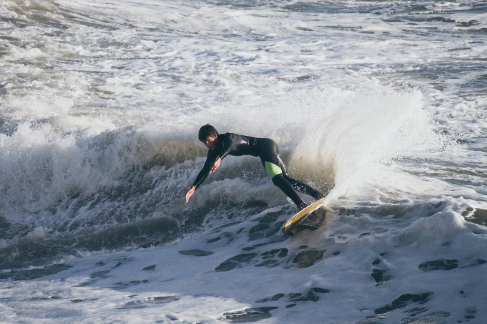 boy surfing in UK