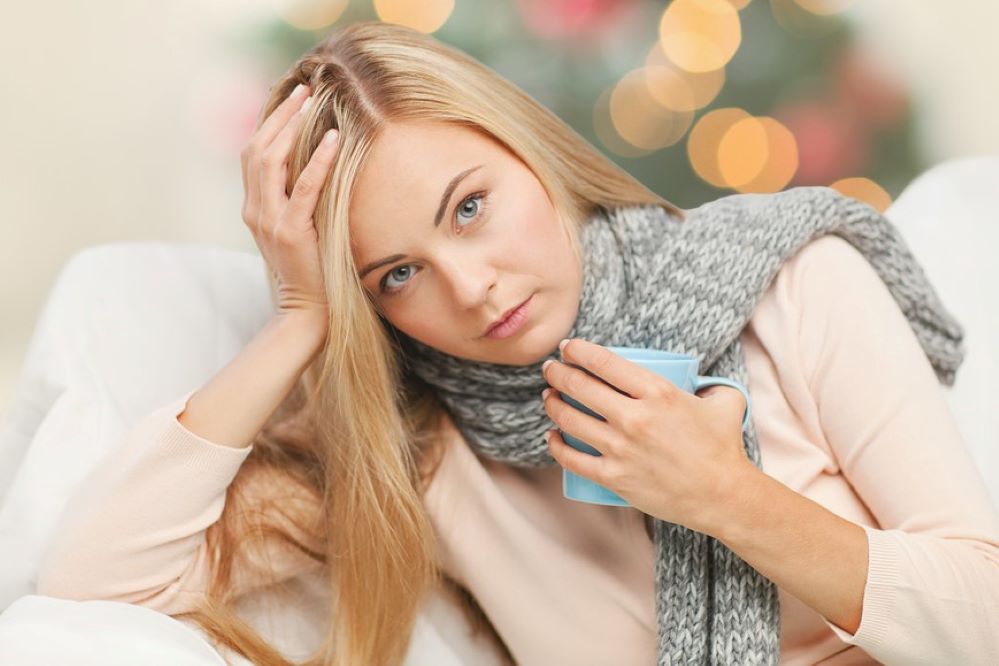 young woman looking sad at xmas