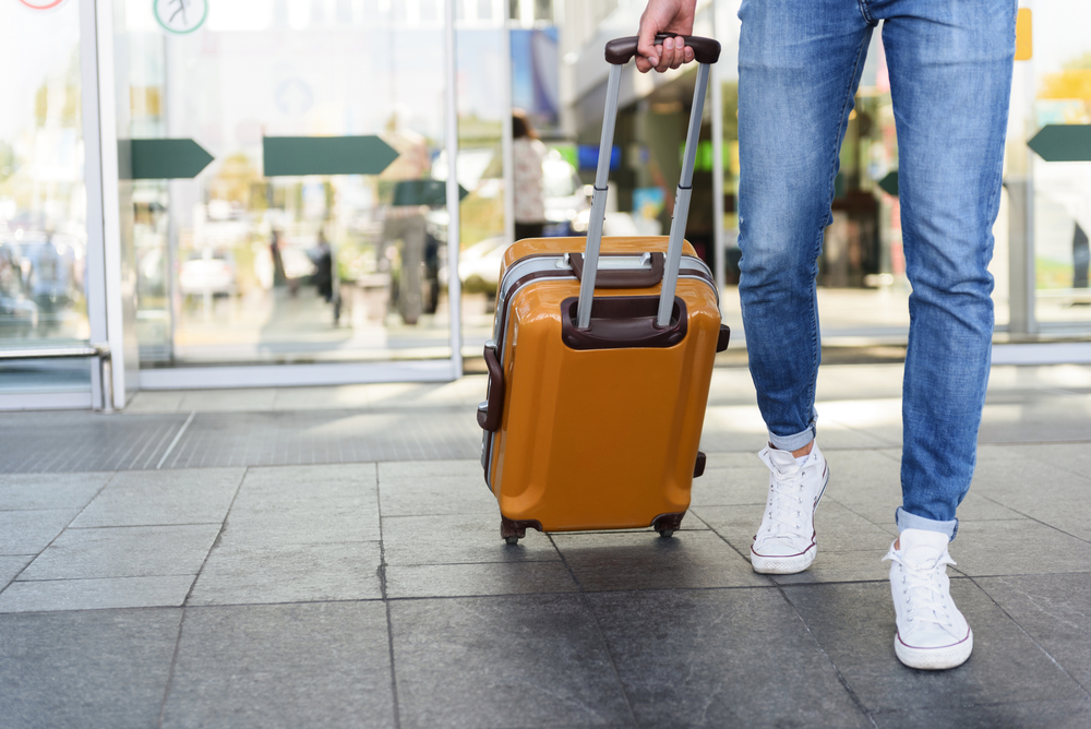 woman with small suitcase