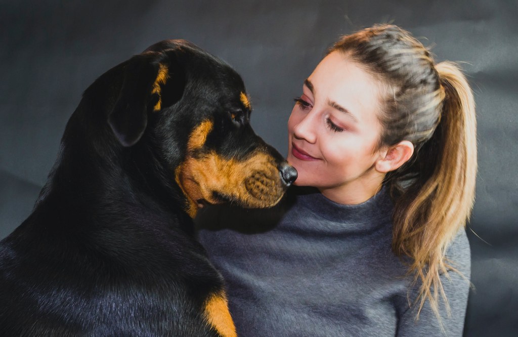 young woman and her canine companion