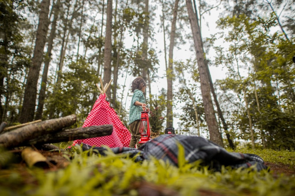 family camping with kids in woods