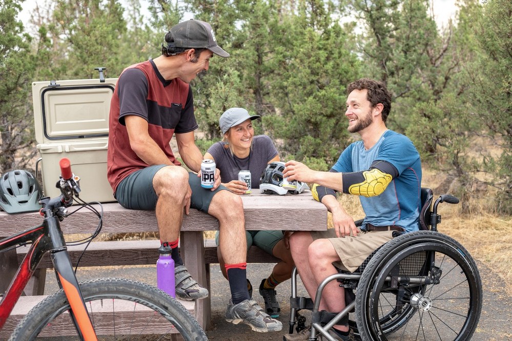 man in wheelchair with his friends