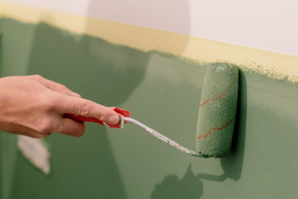 paint roller with relaxing green paint