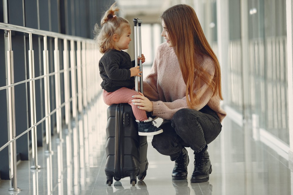 mum and daughter at airport