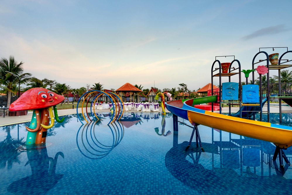 hotel pool with water slides