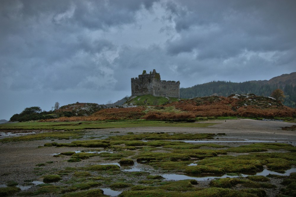 driving a motorhome in Scotland - beach and castle in background