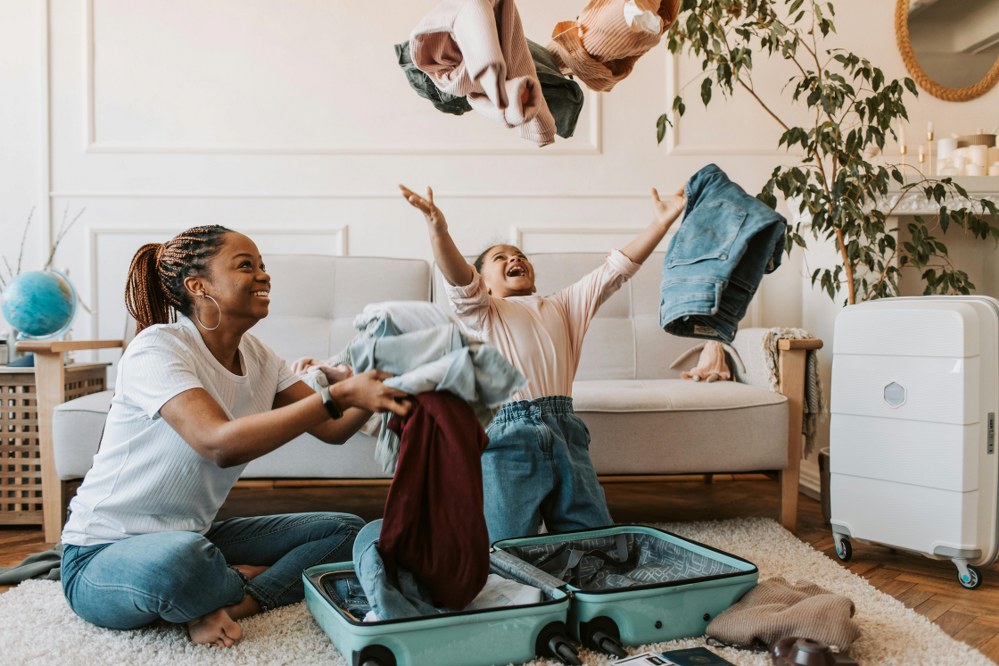 mother and child packing for family holiday