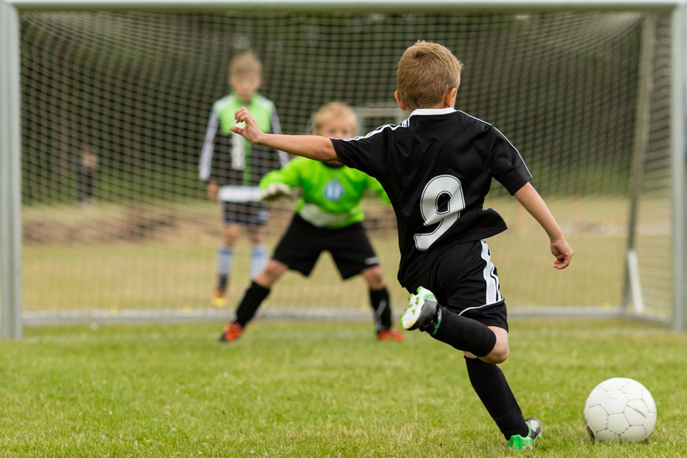 kids playing football