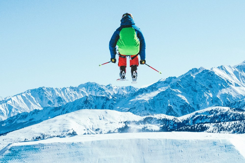 teenage skier jumping