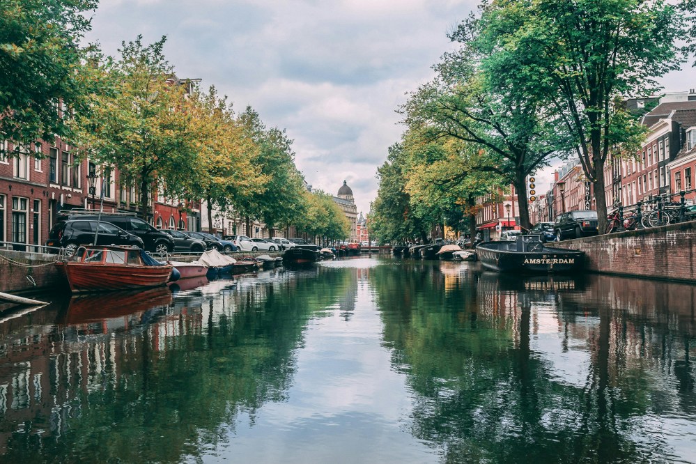 canal in Amsterdam with boats