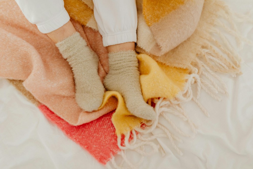 fluffy socks and loungewear are family travel essentials