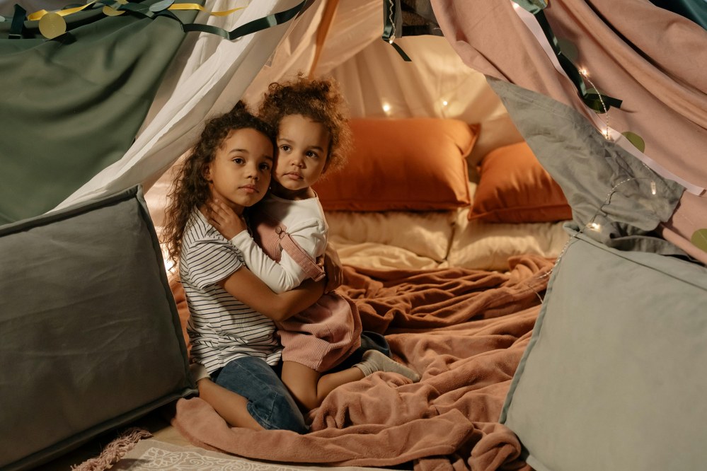 glamping solo with kids: two children in tent
