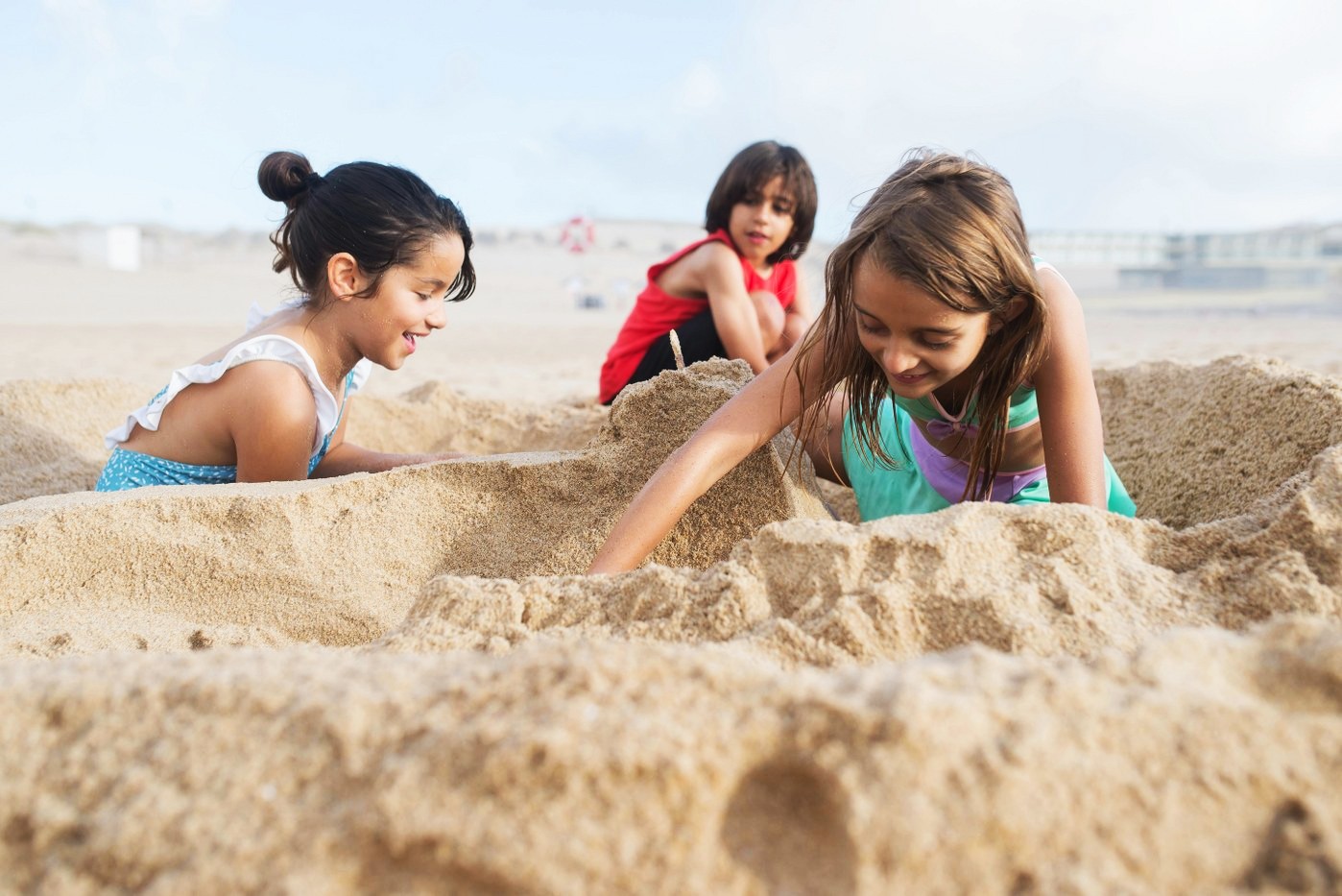 group travel: kids bond on the beach