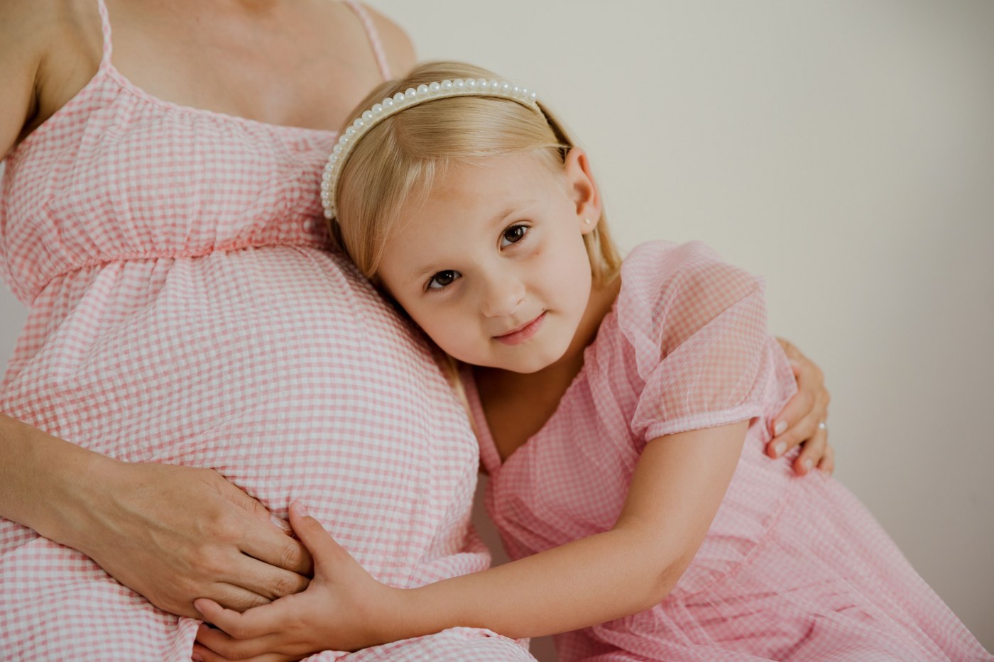 pregnant mum and daughter